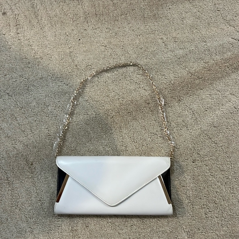 Aldo white, black and gold clutch never used - new